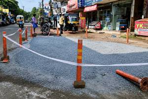 Volunteers covering a roadside pit